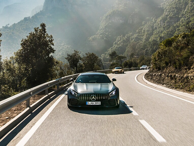 Front view of a Mercedes-AMG GT R on the road.
