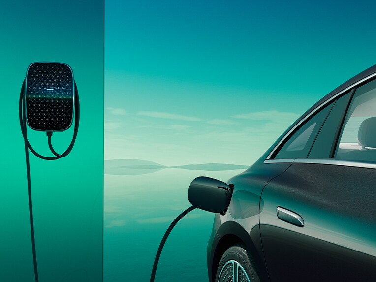 The EQE Saloon from Mercedes-Benz charging at a Mercedes Benz Wallbox.