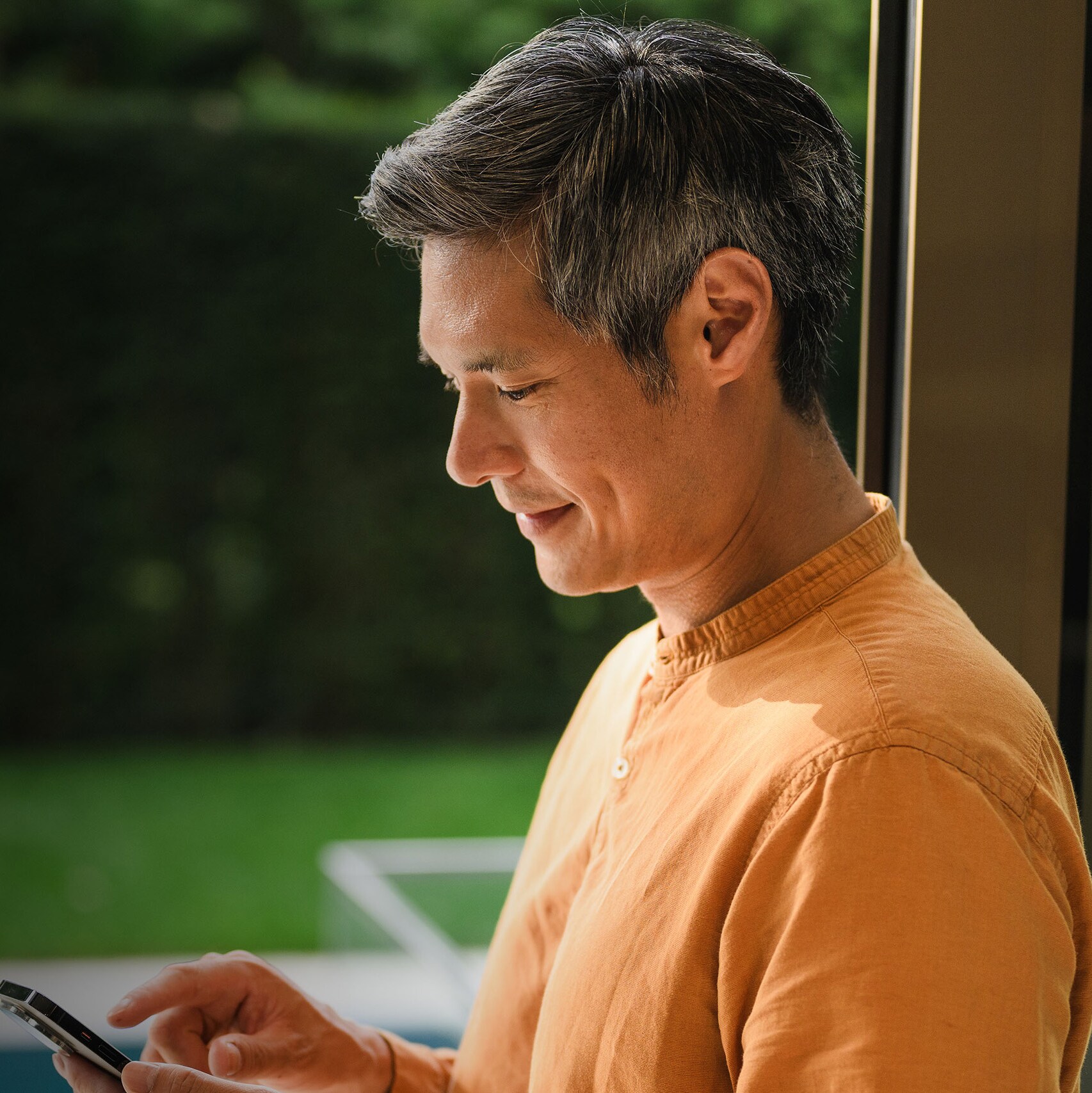 A person using their mobile device.