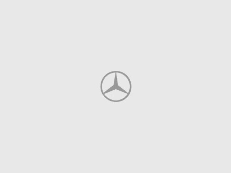 The Mercedes-Benz eSprinter Panel Van with charging cable plugged in.