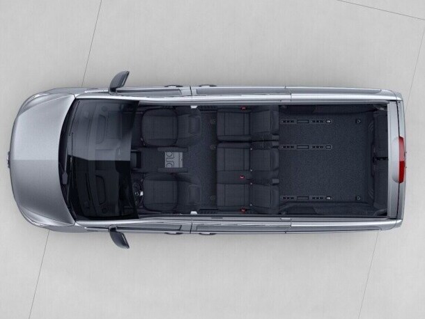 The long eVito Tourer with seating comprising a 3-seater bench seat in the 1st row with folding outer seat and seating removed in the 2nd row of the passenger compartment.