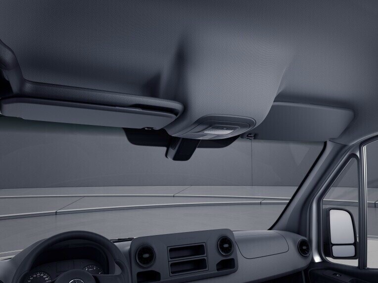 A stowage facility divided into 2 compartments is installed above the windscreen.