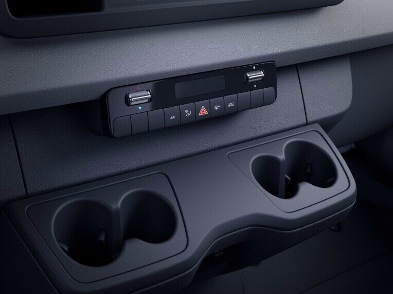 The cupholders in the centre console hold cups, bottles or cans and keep them in place while driving.