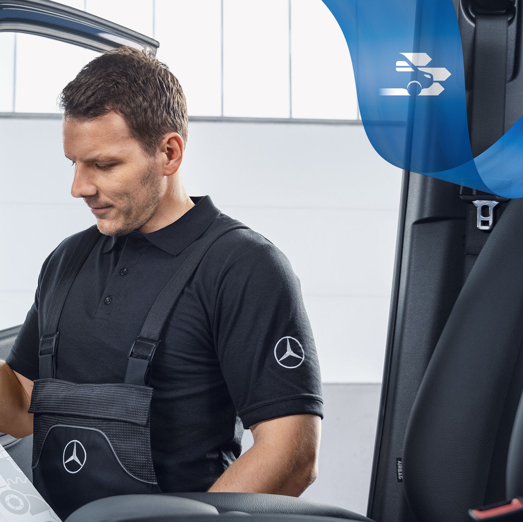 Mechanic checking Mercedes-Benz GenuineParts inside the van.